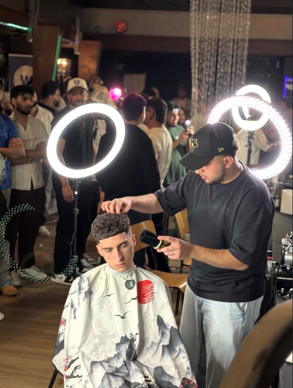 Mo competing at a live barber championship